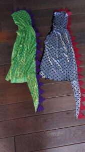 dino capes